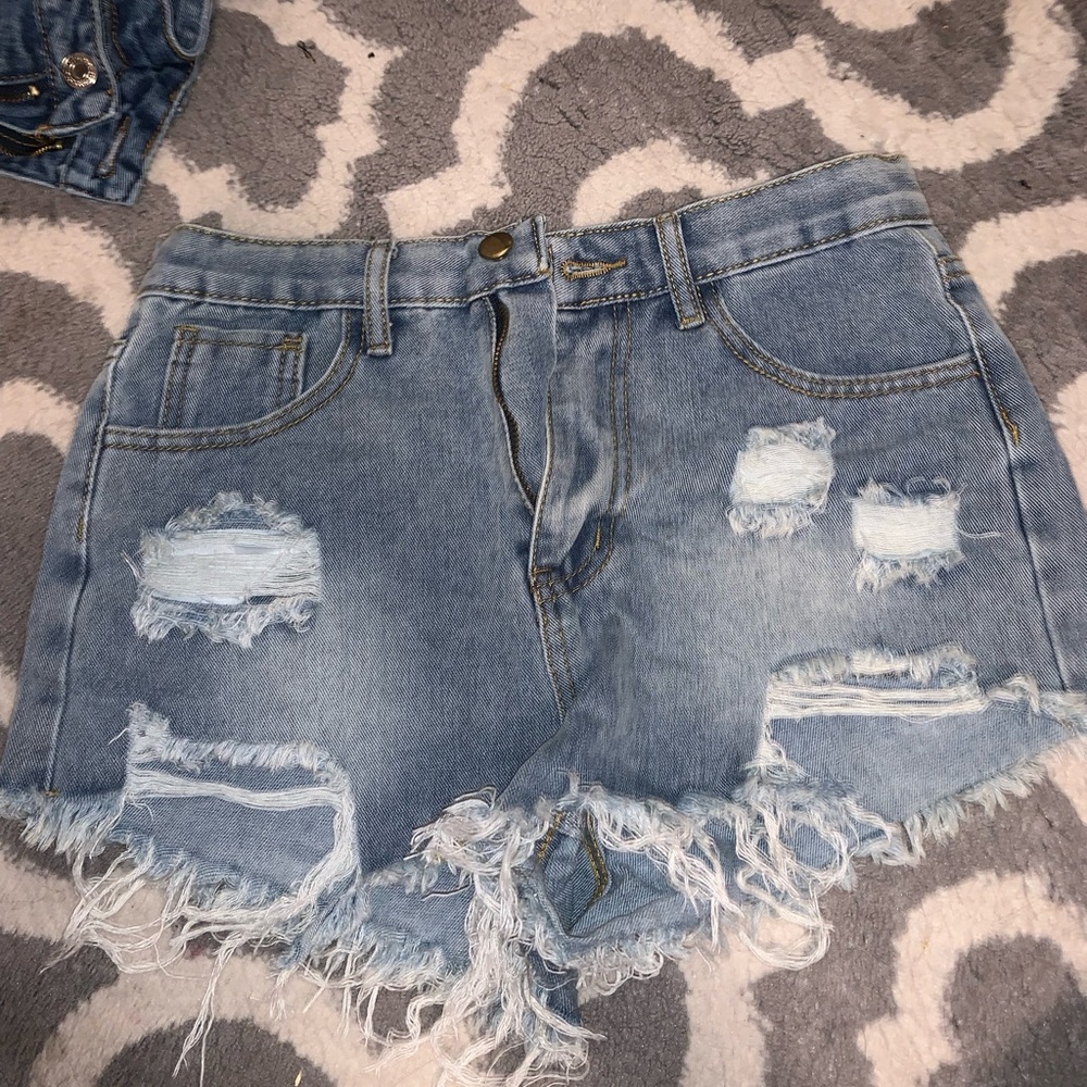 Blue denim ripped jean shorts